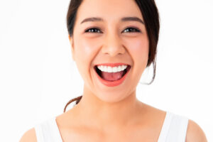 Woman smiling confidently showing bright, even white teeth